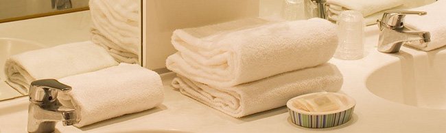 Serviettes ponges, draps de bain